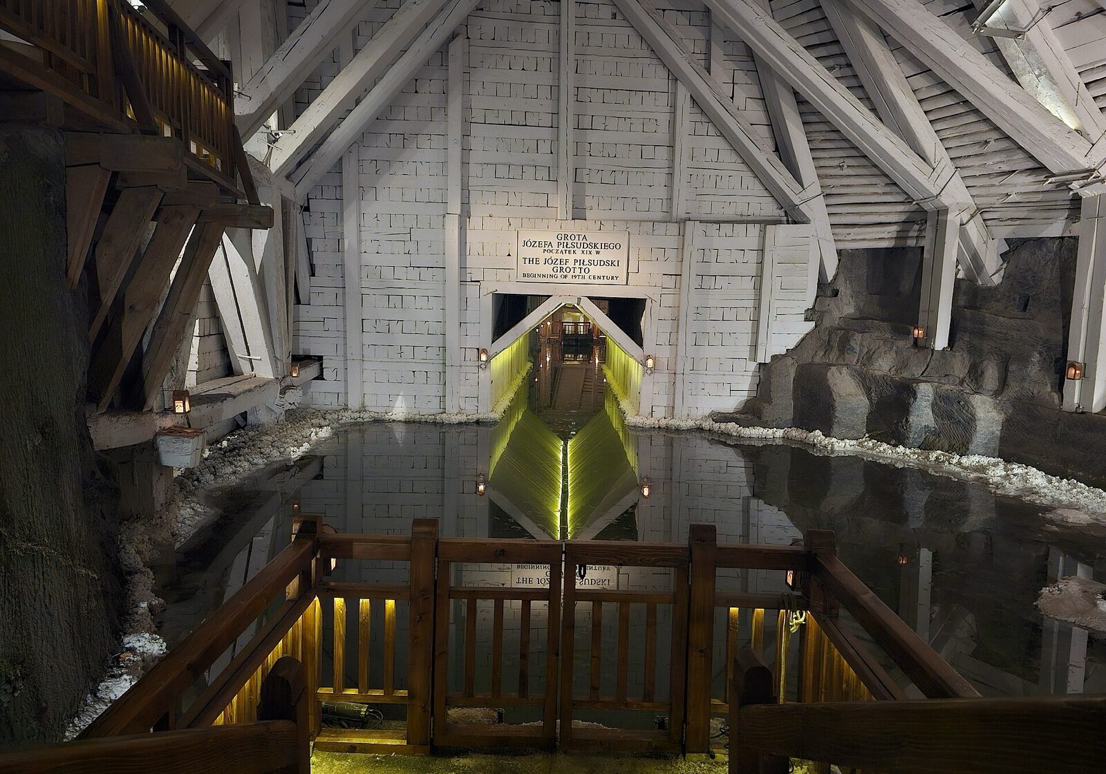 An illuminated underground brine lake in the Wieliczka Salt Mine