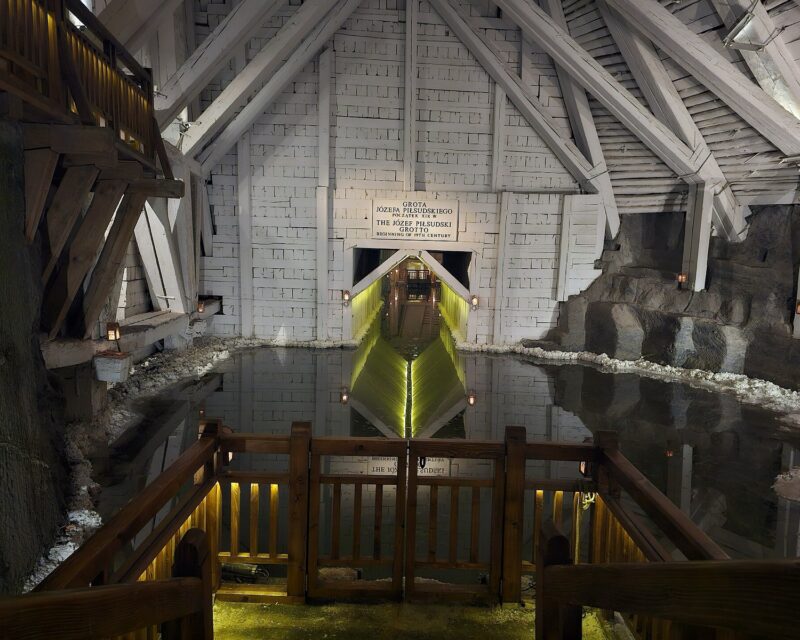 An illuminated underground brine lake in the Wieliczka Salt Mine